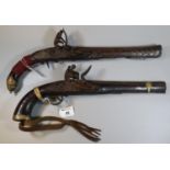 Indian or Afghan flintlock muzzle loading pistol with studded decoration and brass end cap. Together