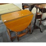 Early 20th century pale oak barley twist gate leg table, together with a reproduction mahogany