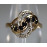 9ct gold sapphire and diamond cluster ring. Ring size L. Approx weight 3.1 grams. (B.P. 21% + VAT)