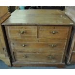 Edwardian design pine straight front chest of two short, and two long drawers on a projecting