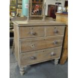 Victorian pine straight front chest of two short and two long drawers on baluster turned feet,