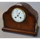 Early 20th Century inlaid mahogany two train mantel clock with arched case and Arabic face. (B.P.