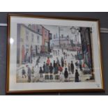 After L.S Lowry, street scene with passing parade, coloured print. 47 x 61cm approx, framed and