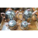 1950s/60s tea and coffee set, pink ceramic ware beneath metal cosies with pink plastic knobs, to