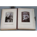 Victorian design album containing various portrait pictures, postcards and photos. (B.P. 21% + VAT)