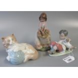 Two Lladro porcelain figurines, one in matte finish, girl with basket of flowers and young boy