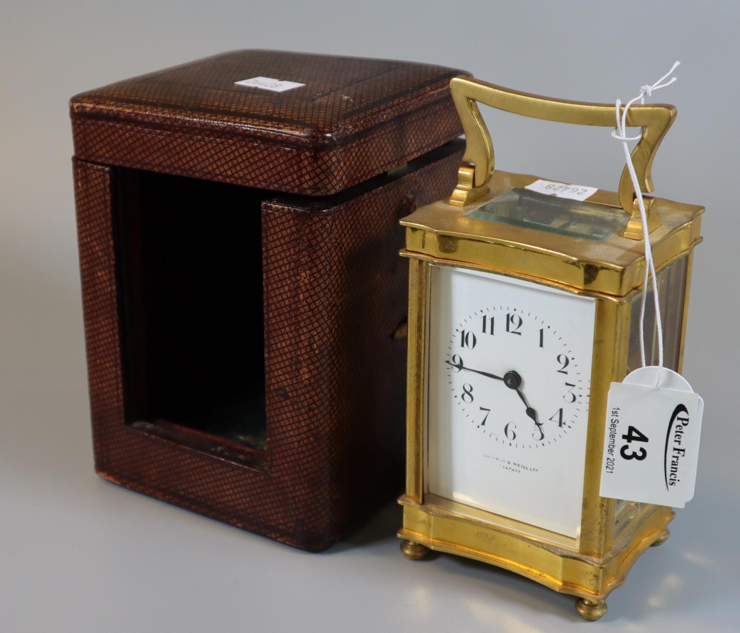French gilt brass carriage clock having full depth Arabic dial marked 'Charman D Neill Ltd Belfast',