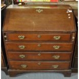 19th century oak fall front bureaux with four long drawers on projecting base with bracket feet. (