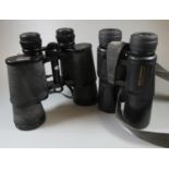 Pair of Minolta Weathermatic 10x42 binoculars, and a pair of Mark Scheffel 30x50 binoculars in