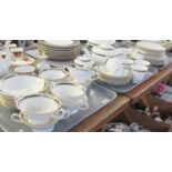 Three trays of Royal Doulton English fine bone china 'Raffles' design tea and dinnerware items to