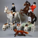 Beswick hunting group to include; 868 rearing horse and huntsman with red jacket and black cap,