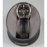 Gentleman's Citizen Eco-Drive chronometer wrist watch with leather strap in original box. (B.P.
