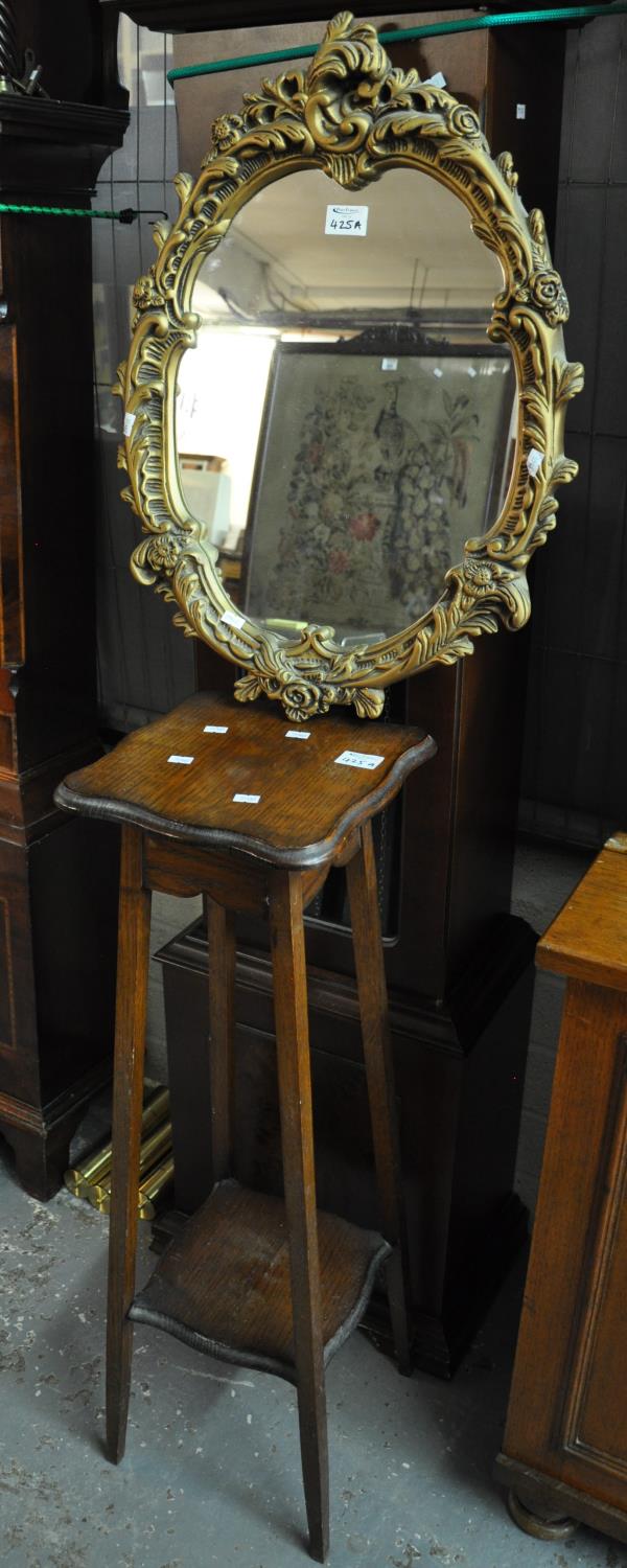 Modern gilt framed foliate moulded mirror, together with an early 20th century oak jardinere stand