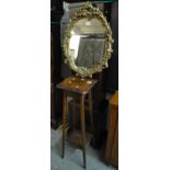 Modern gilt framed foliate moulded mirror, together with an early 20th century oak jardinere stand