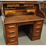 Early 20th Century oak 'S' roll tambour twin pedestal desk. (B.P. 21% + VAT)