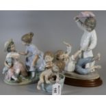 Two Spanish Nao porcelain figure groups of young children in play, together with a Lladro Spanish