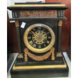 19th Century two train black slate architectural mantel clock with black gilded Roman face, having