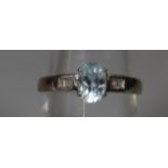 9ct white gold aquamarine and diamond ring. Ring size M. Approx weight 2 grams. (B.P. 21% + VAT)
