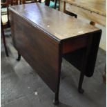 18th Century mahogany drop leaf table on tapering legs and pad feet. (B.P. 21% + VAT)