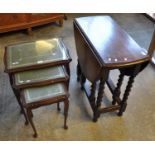 Early 20th Century oak barley twist gate legged table, together with a nest of three reproduction