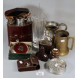 Plastic tray of oddments to include tankards, leather and glass hipflask, hipflask in the form of