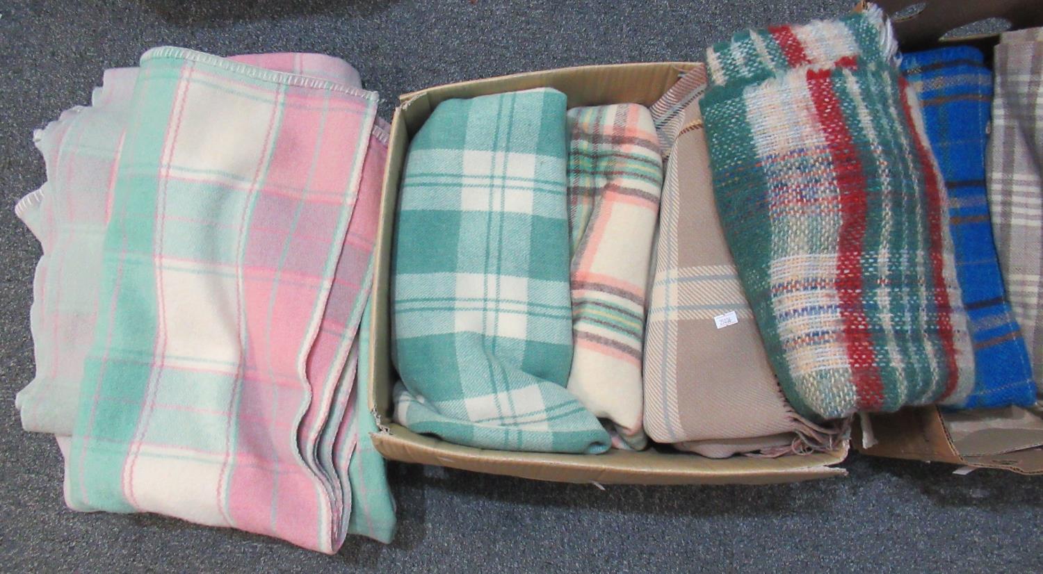 Two boxes containing various woollen blankets and throws. (11) (B.P. 21% + VAT)