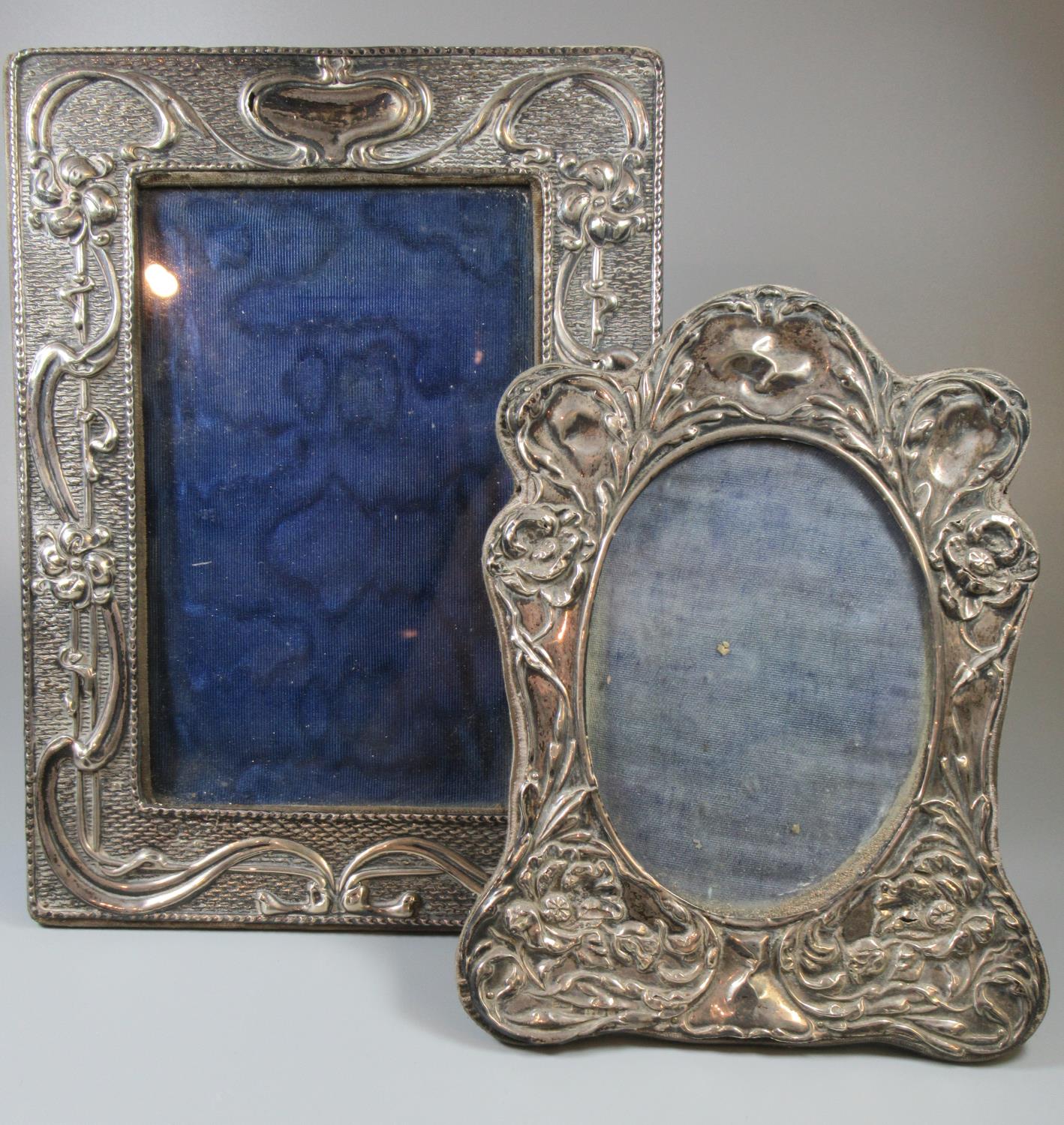 Two silver art nouveau picture frames with organic repousse decoration. (2) (B.P. 21% + VAT)