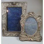 Two silver art nouveau picture frames with organic repousse decoration. (2) (B.P. 21% + VAT)