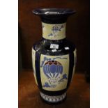 Modern Middle Eastern design dark blue ground baluster shaped china vase, decorated with hot air