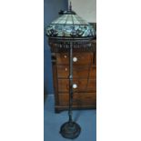 Tiffany style standard lamp, the multi-coloured floral shade with amber coloured glass droplets on a