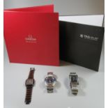 Omega The Collection book, together with a similar Tag Heuer book,together with a shoe box of