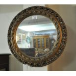 Mid Century gilt framed and pierced foliate mirror of circular form. (B.P. 21% + VAT)