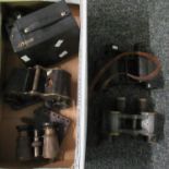 Box of binoculars and camera equipment to include; a Kodak no. 120 Hawk Eye Canadian box camera,