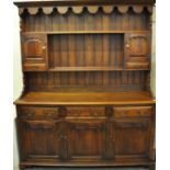 18th Century style oak rack back two stage dresser with ogee fielded panel design. (B.P. 21% + VAT)