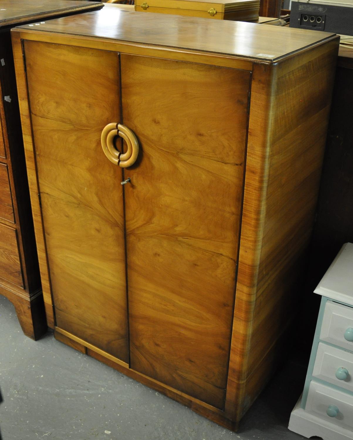 Art Deco design walnut two door blind panelled gentleman's free standing wardrobe. (B.P. 21% + VAT)