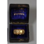 18ct gold engraved wedding ring. Ring size L. Approx weight 6.3 grams. (B.P. 21% + VAT)