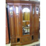 Edwardian walnut and mahogany break front mirrored wardrobe with dental cornice and fitted