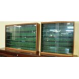 Two similar teak framed diecast model display units with glazed sliding doors. (2) (B.P. 21% + VAT)