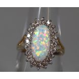 9ct gold synthetic opal and white stone ring. Ring size L. Weight approx 3.2 grams. (B.P. 21% + VAT)