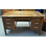 Early 20th Century oak twin pedestal knee hole desk. (B.P. 21% + VAT)