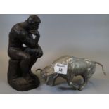 Small bronzed resin sculpture 'The Thinker', 25cm high approx, modern. Together with a heavy cast