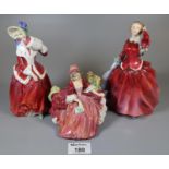 Three Royal Doulton bone china figurines to include; 'Blythe Morning' HN2065, 'Christmas Morn'
