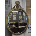 19th century style gilt framed oval mirror with moulded shell and foliate mount. (B.P. 21% + VAT)