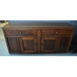 19th Century oak sideboard/dresser base having two drawers above two blind panelled doors. (B.P. 21%