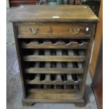 Solid oak single drawer free standing wine rack. (B.P. 21% + VAT)