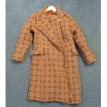 Brown ground vintage 70's Welsh tapestry coat with a 'Made in Wales, Corgi 100% new wool' label. (