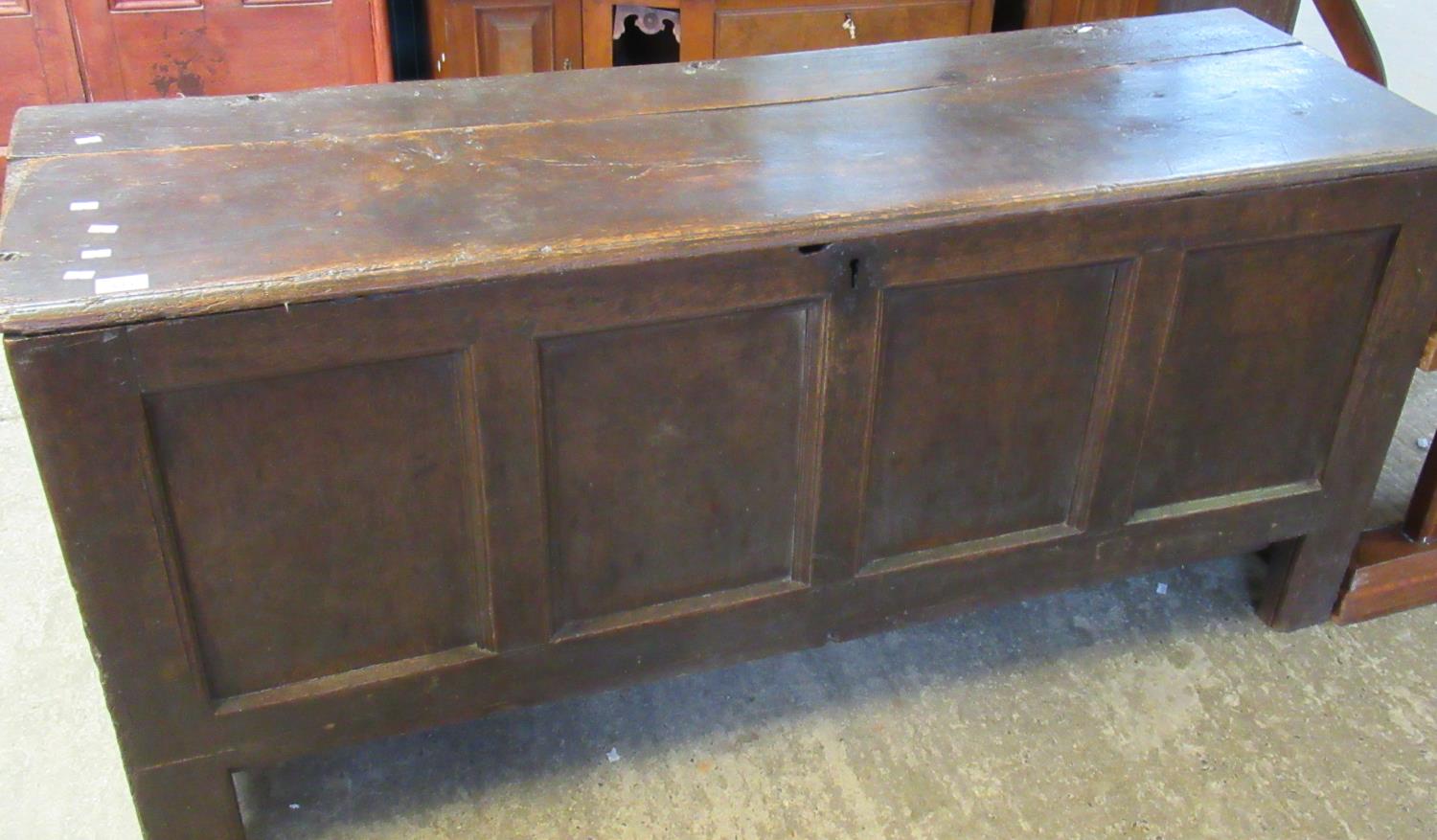 18th Century Welsh oak coffer having moulded top above four fielded rectangular panels on stile