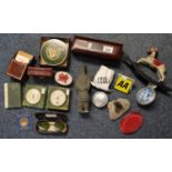 Box of oddments to include onyx desk barometers, AA & RAC car badges, pair of vintage cased