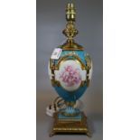 20th Century porcelain classical design table lamp having gilt mounts with ribbon detail