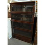 Early 20th Century mahogany Kenrick & Jefferson four section bookcase with metal mounts. (B.P. 21% +